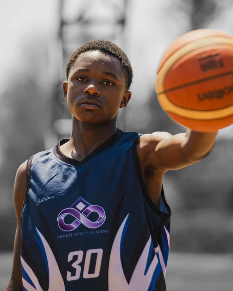 Young athlete holding a basketball